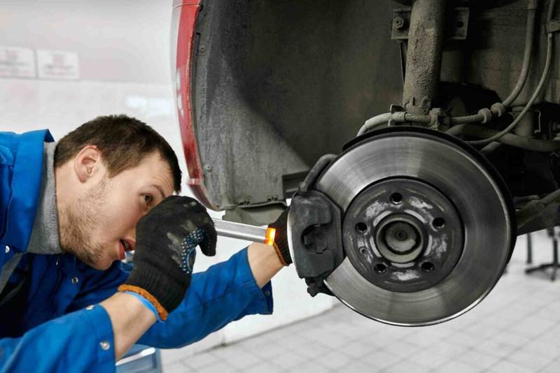 Checking brake pads and its contact with the rotor